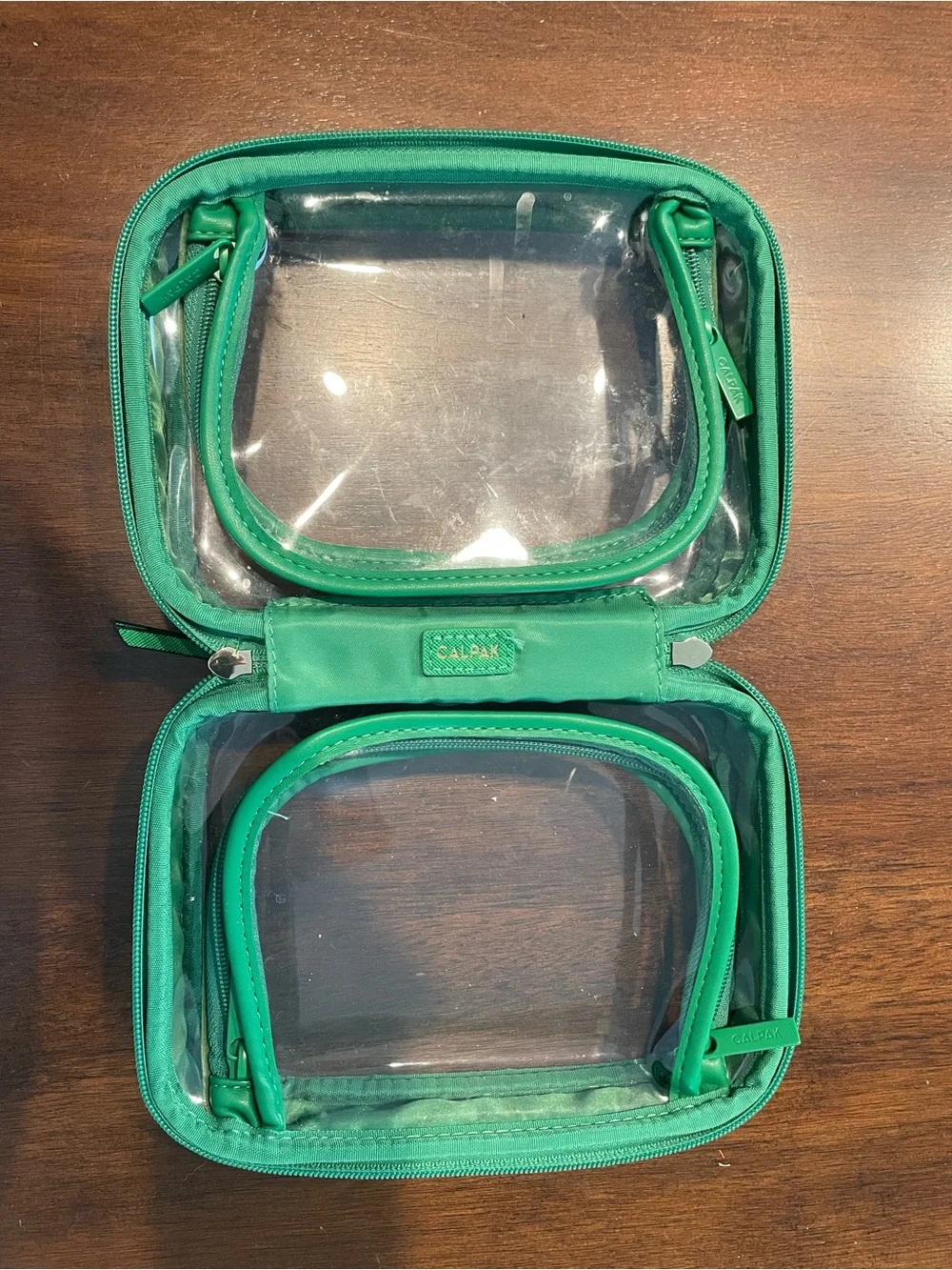 Calpak Small Clear Cosmetics Case in Green
